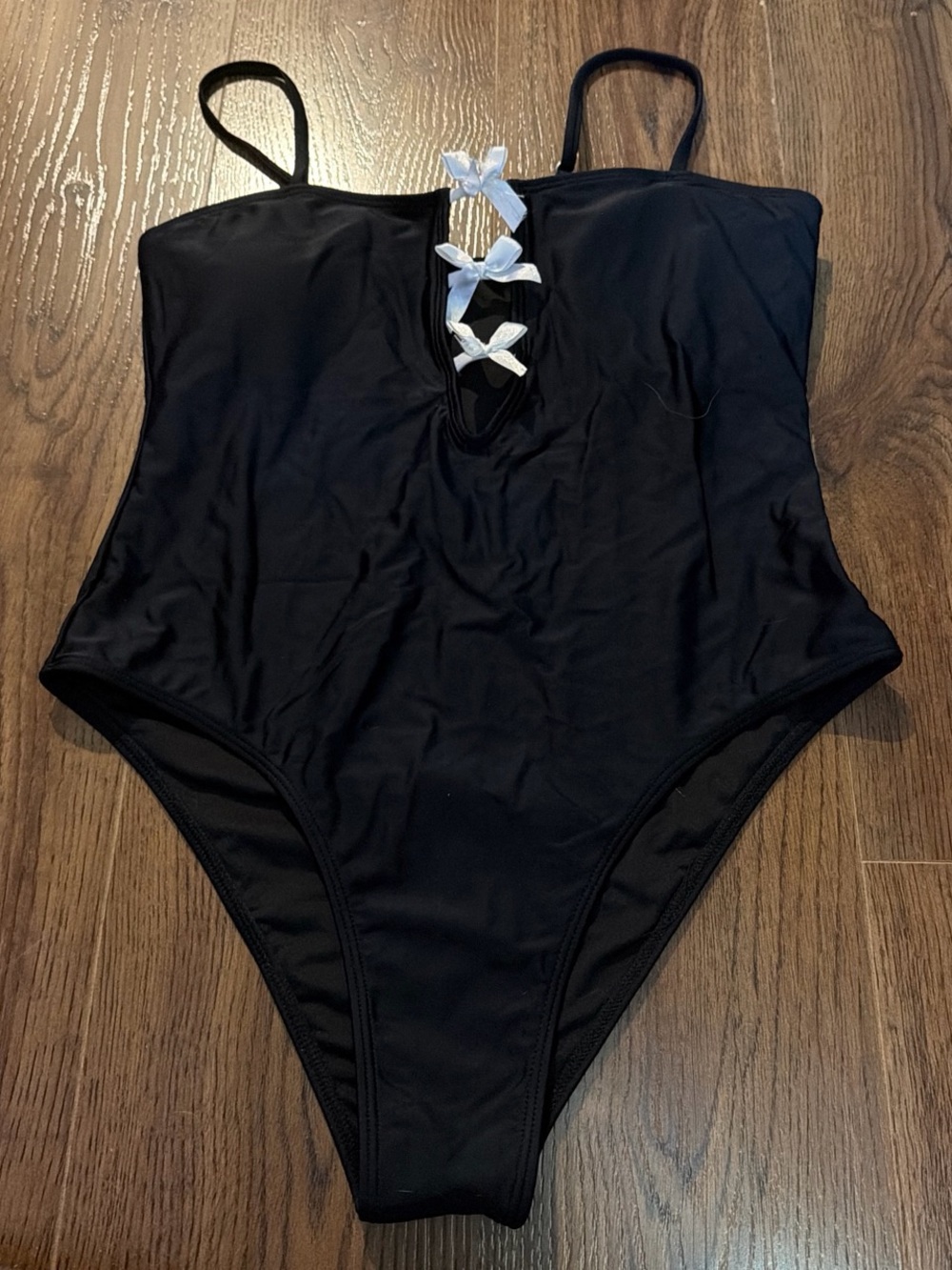 Cider Black One-Piece Swimsuit with White Bow Detail